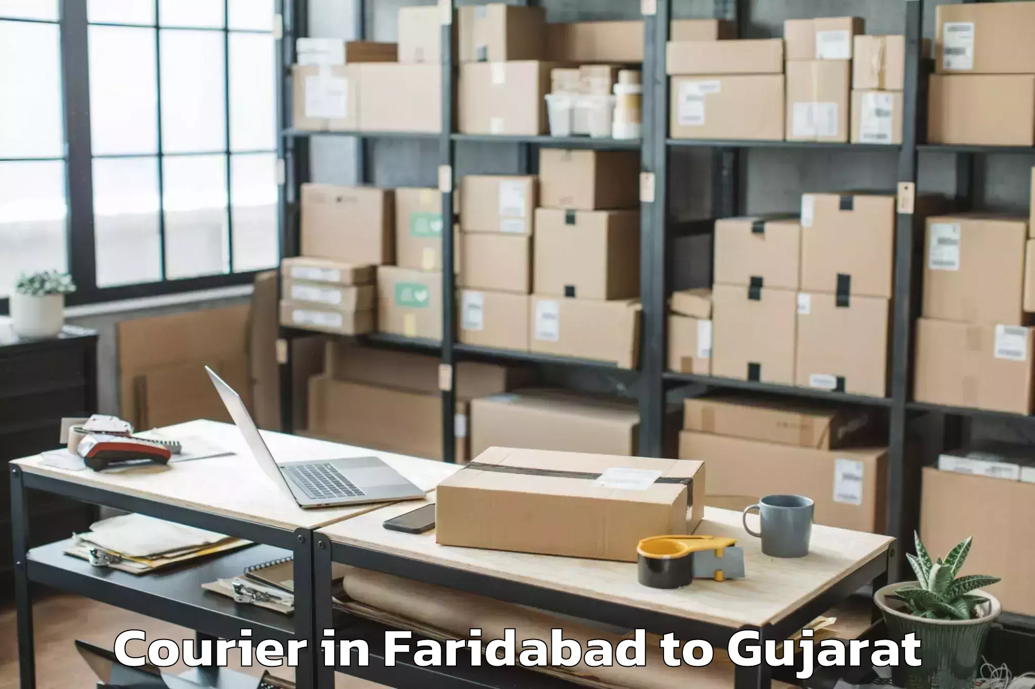 Expert Faridabad to Hansot Courier